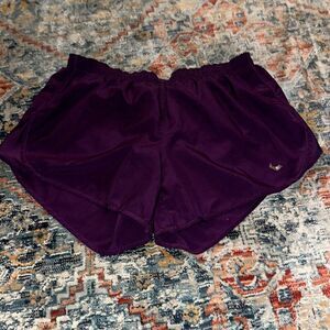 Purple Nike running shorts
